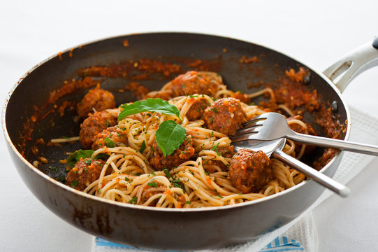 Original Italian spaghetti with meatballs in tomato sauce