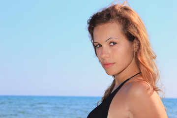 Naklejka premium Attractive girl on the beach