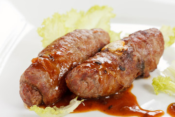 grilled sausages with sauce