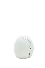 isolated cracking egg on white