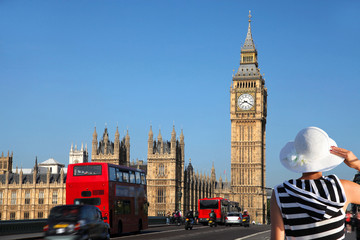 Woman watching Big Ben in London, UK