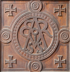 Milan -  church gate - Virgin Mary monogram