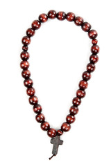 Naklejka premium wooden beads with a cross isolated
