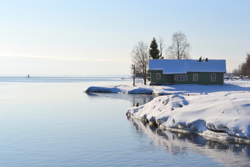 Coast of  Onega lake, sunny winter day.