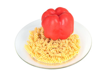 Macaroni in a transparent plate on straw mat