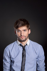 emotional business man man over gray background