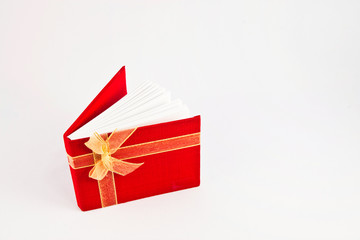 Red notebook on white background
