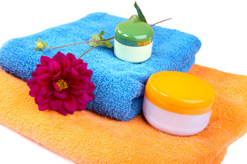 Terry towels tubes and a flower isolated