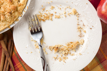 Flat Lay Mockup Overhead of Pie, Apple, Cinnamon, Copy Spaced Crumbs on Plate