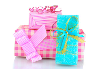 Beautiful pink and blue gifts isolated on white