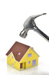 Hammer and model house