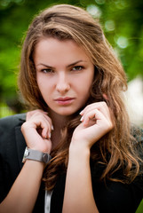 Naklejka premium Gorgeous young woman outdoors portrait.