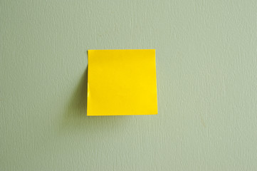 Post-It Note on green texture background