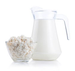 Cup serving of Cottage Cheese and Jug of fresh milk Isolated on