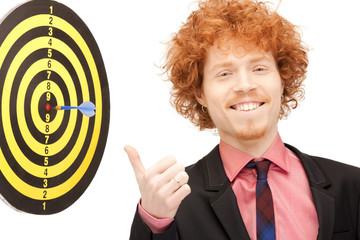 businessman with dart and target