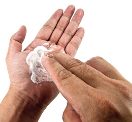 Hand with facial foam.