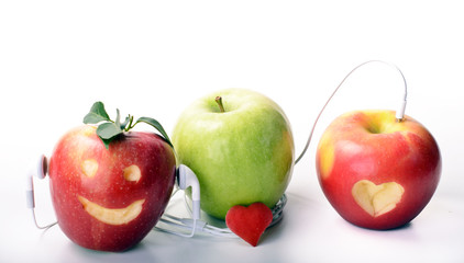 Three apples love music and themselves