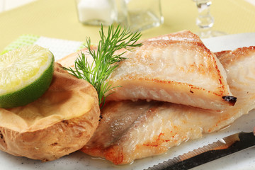 Pan fried fish fillets and potato