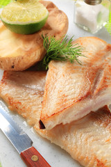 Pan fried fish fillets and potato