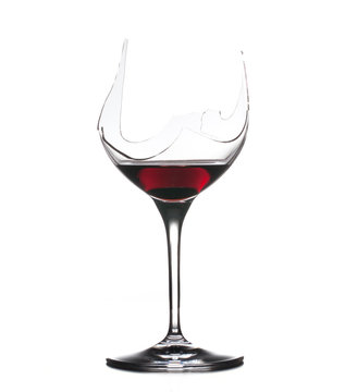 Demon drink red wine in glass