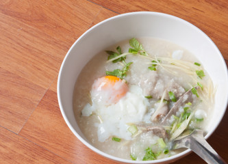 Thai style breakfast with pork and soft-boiled egg