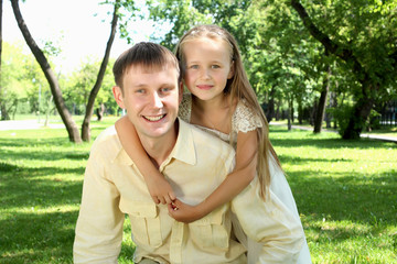 Father with daugther outside
