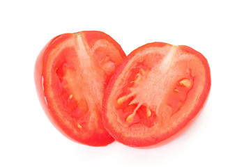 Tomato. Sliced half red tomato.
