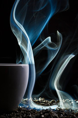 Dry tea with blue smoke