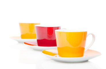 Colorful tea cups with tea