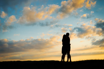 Young couple  at sunset