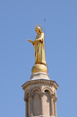 Fototapeta premium Gilded statue of Virgin Mary at cathedral in Avignon, France