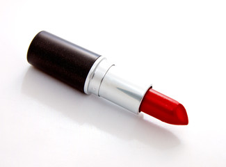 red lipstick on white background