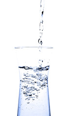 pouring water into a glass