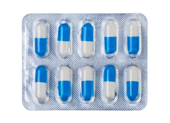 Pills in pack isolate on white background.