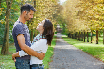 Young Couple Walking in autumn park