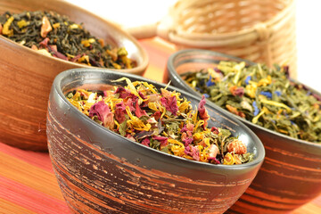 Composition with tea leaves in bowls
