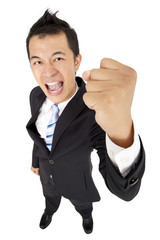happy and excited businessman with fist