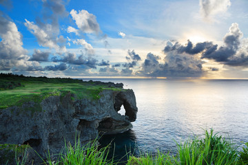sunset on the rocks , in Okinawa , Manzamo - obrazy, fototapety, plakaty