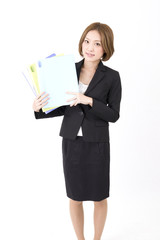 Beautiful business woman with file