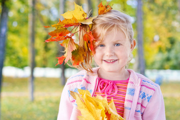 smile girl in autumn park