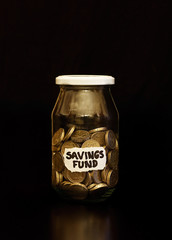 British Pound Coins in Jar