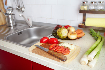 Kitchen interior with fresh vegetables