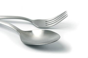 Spoon and fork isolated on white background