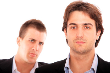 two business men discuss.