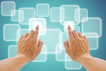 hand pushing a button on a touch screen interface