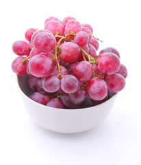 Image of red grape in bowl isolated on white