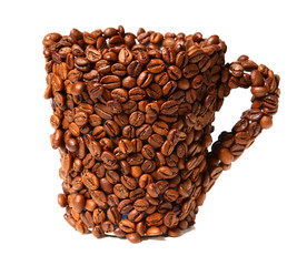 Mug covered with coffee beans isolated on white