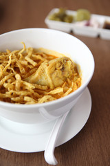Noodle Khao soi , Thai food on wood background