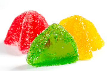 Coloured jelly sweets on a white background