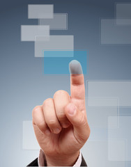 The hand pressing one blue button